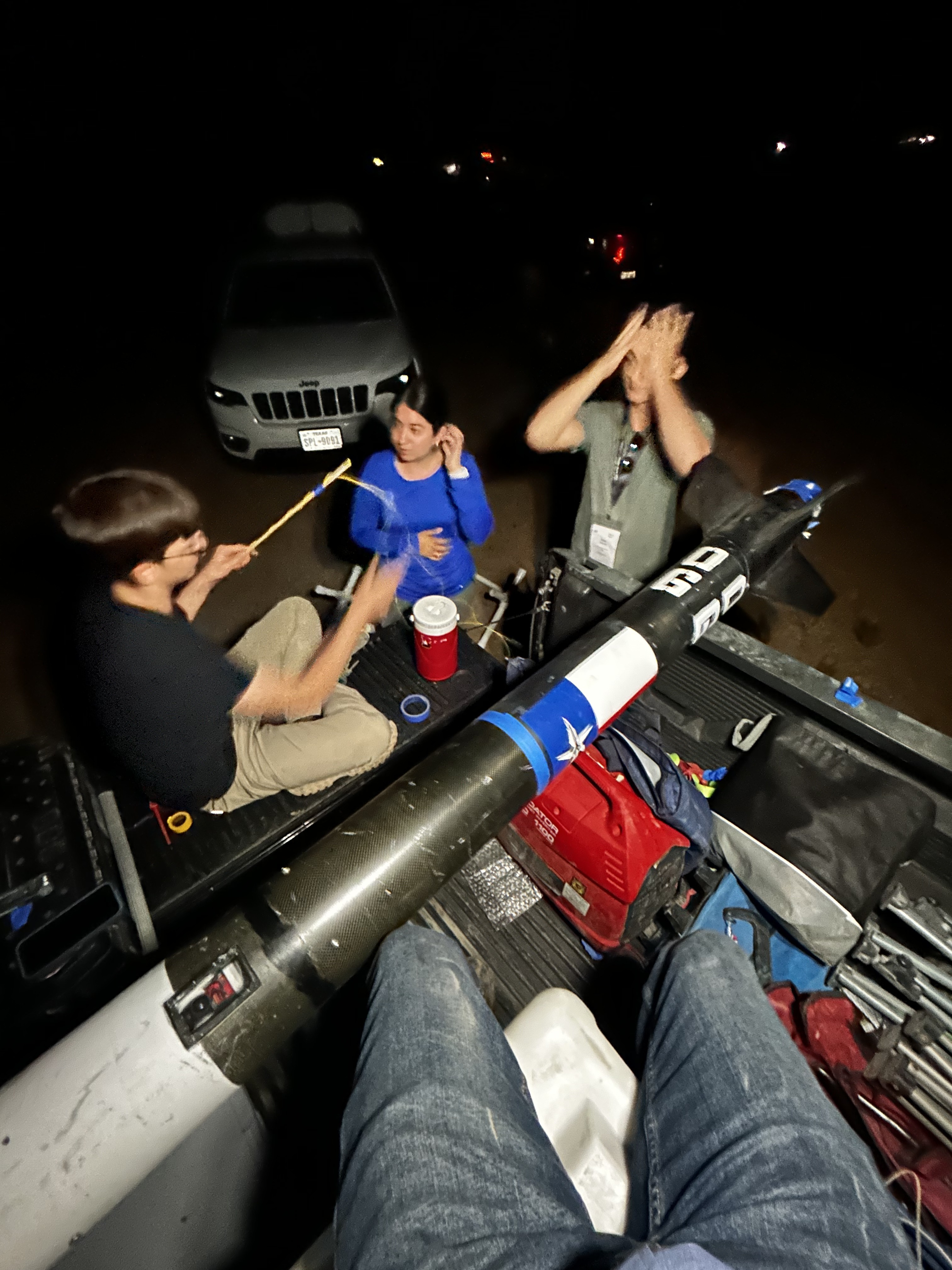 SRT-11 members integrating Telemachus hardware before dawn at Spaceport America